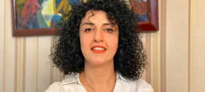 FILE PHOTO: Iranian human rights activist and the vice president of the Defenders of Human Rights Center (DHRC) Narges Mohammadi poses in this undated handout picture. Mohammadi family archive photos/Handout via REUTERS/File Photo