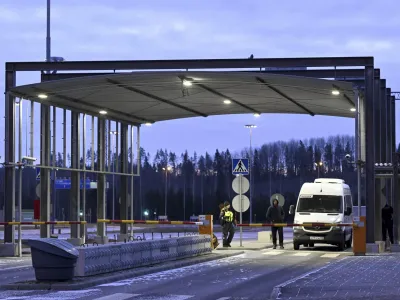 A van at the Nuijamaa, a border station between Russia and Finland in Lappeenranta, Finland, Thursday, Nov. 16, 2023. Finland's government says it will close four crossing points on its long border with Russia to stop the flow of migrants that it accuses Moscow of ushering to the border in recent months. Finnish officials say they will be closed at midnight Friday on the land border that serves as the European Union's external border. (Vesa Moilanen/Lehtikuva via AP)