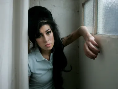 FILE - In this Feb. 16, 2007 file photo, British singer Amy Winehouse poses for a photograph at a studio in north London, Friday, Feb. 16, 2007. British police say singer Amy Winehouse has been found dead at her home in London on Saturday, July 23, 2011. The singer was 27 years old. (AP Photo/Matt Dunham, File)