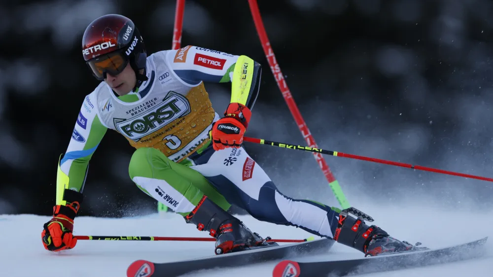 Slovenia's Zan Kranjec speeds down the course during an alpine ski, men's World Cup giant slalom race, in Alta Badia, Italy, Sunday, Dec. 17, 2023. (AP Photo/Alessandro Trovati)