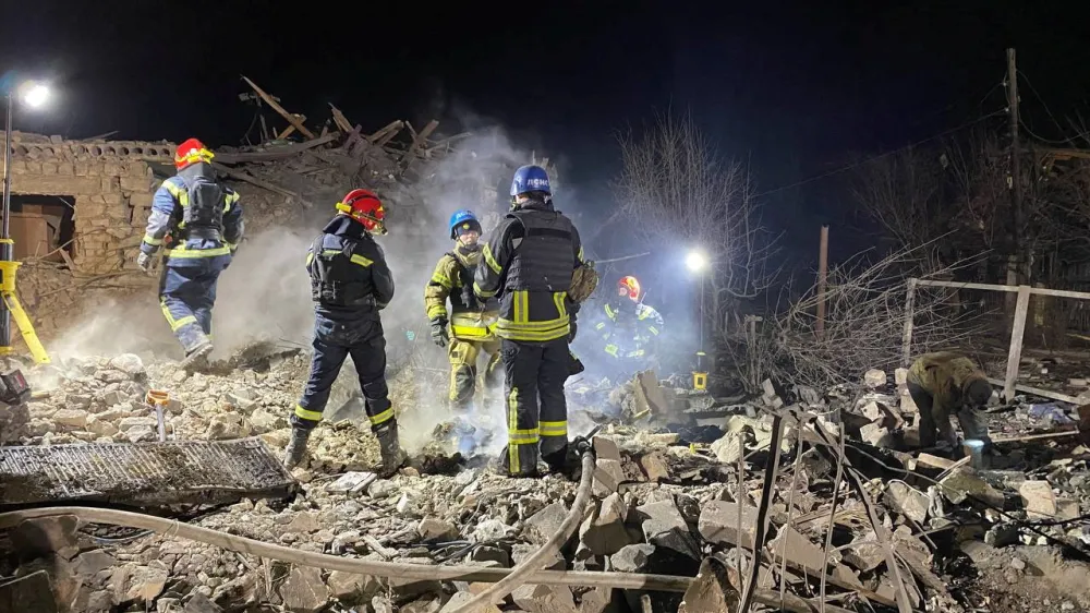 Rescuers work at the site of a Russian missile strike in an area of the Pokrovsk town, amid Russia's attack on Ukraine, in Donetsk region, Ukraine January 6, 2024. Press service of the State Emergency Service of Ukraine in Donetsk region/Handout via REUTERS ATTENTION EDITORS - THIS IMAGE HAS BEEN SUPPLIED BY A THIRD PARTY.