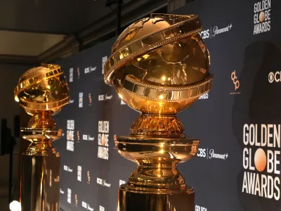FILE - Replicas of Golden Globe statues appear at the nominations for the 81st Golden Globe Awards at the Beverly Hilton Hotel on Monday, Dec. 11, 2023, in Beverly Hills, Calif. The 81st Golden Globe Awards will be held on Sunday, Jan. 7, 2024. (AP Photo/Chris Pizzello, File)