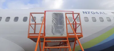 This photo released by the National Transportation Safety Board shows a gaping hole where the paneled-over door had been at the fuselage plug area of Alaska Airlines Flight 1282 on Sunday, Jan. 7, 2024, in Portland, Ore. A panel used to plug an area reserved for an exit door on the Boeing 737 Max 9 jetliner blew out Jan. 5, shortly after the flight took off from Portland, forcing the plane to return to Portland International Airport. (National Transportation Safety Board via AP)