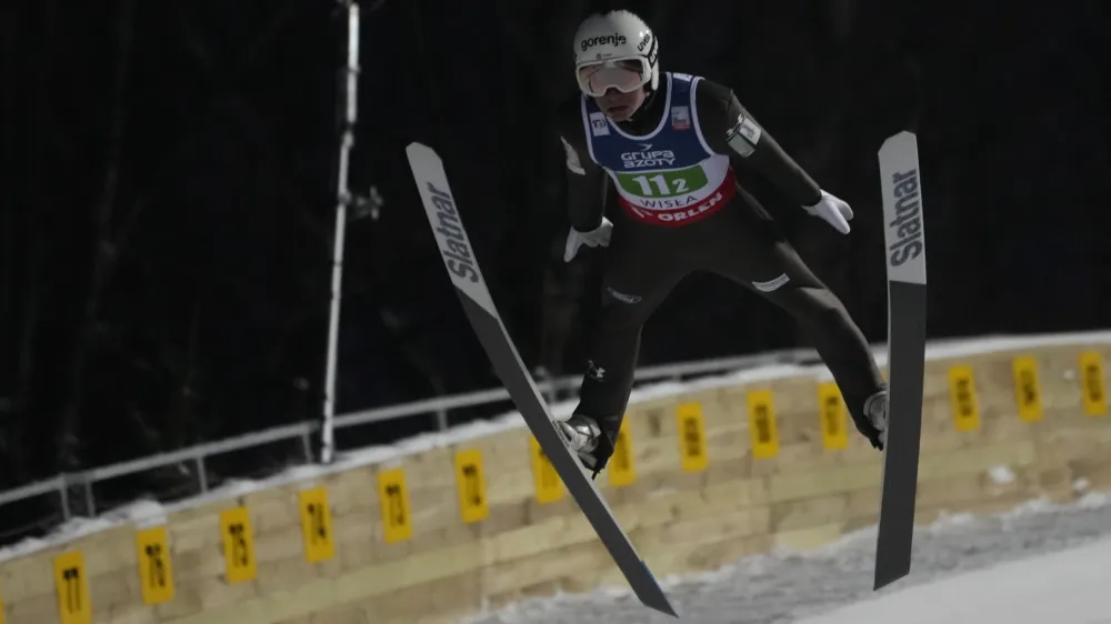 Slovenia's Anze Lanisek competes at the Super Team Large Hill Ski Jumping World Cup event in Wisla, Poland, Saturday, Jan. 13, 2024. (AP Photo/Czarek Sokolowski)