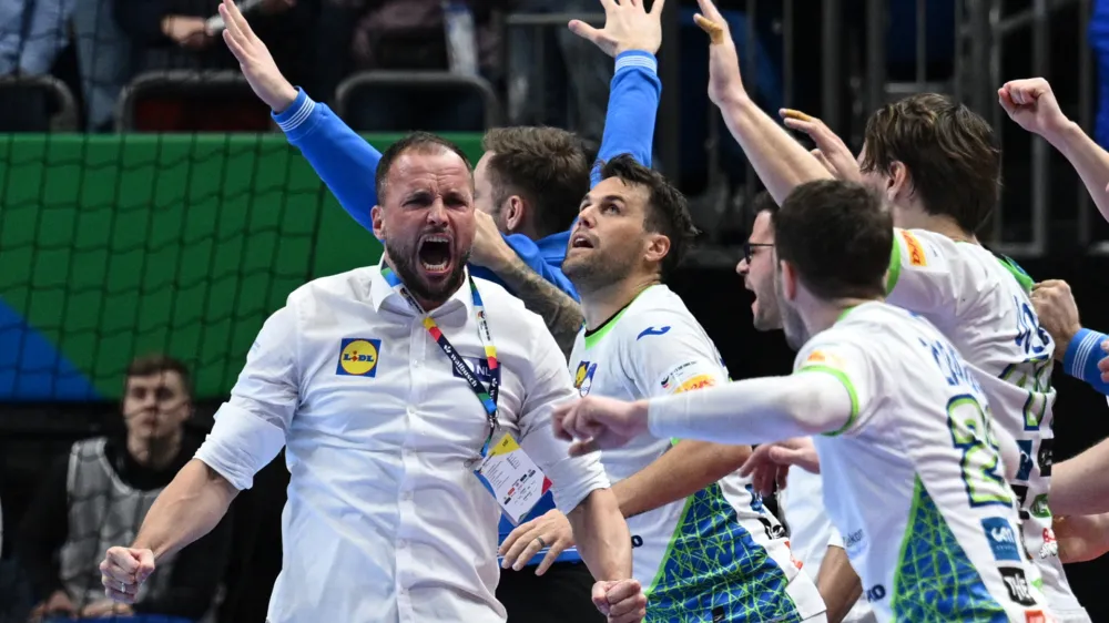 Handball - EHF 2024 Men's European Handball Championship - Preliminary Round - Group D - Norway v Slovenia - Mercedes-Benz Arena, Berlin, Germany - January 15, 2024 Slovenia head coach Uros Zorman celebrates after the match REUTERS/Annegret Hilse