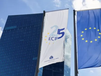 FILE PHOTO: A view shows the European Central Bank (ECB) flag and the flag of the European Union in front of the ECB Building, on the day of the monthly news conference following the ECB's monetary policy meeting in Frankfurt, Germany, September 14, 2023. REUTERS/Wolfgang Rattay/File Photo