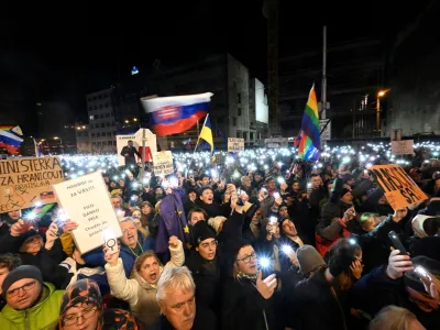 Demonstrators attend a protest against the government's proposal to cancel a branch of prosecution which the opposition says will let serious economic crimes remain unpunished and protect government figures, in Bratislava, Slovakia, January 25, 2024. REUTERS/Radovan Stoklasa