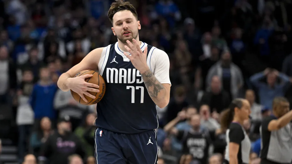 Jan 27, 2024; Dallas, Texas, USA; Dallas Mavericks guard Luka Doncic (77) reacts to a foul call during the second half against the Sacramento Kings at the American Airlines Center. Mandatory Credit: Jerome Miron-USA TODAY Sports