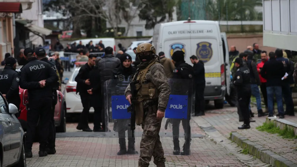 Turkish police stand guard outside the Italian Santa Maria Catholic Church after two masked gunmen were shooting during Sunday service, in Istanbul, Turkey January 28, 2024. REUTERS/Dilara Senkaya