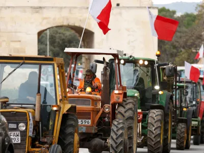 Farmers drive tractors during a protest against European agricultural policies, in Floriana, Malta February 2, 2024. REUTERS/Darrin Zammit Lupi