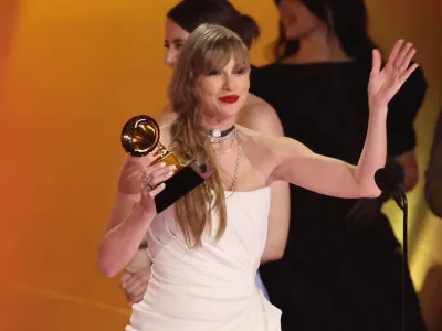 Taylor Swift accepts the award for Album of the Year for Midnights during the 66th Annual Grammy Awards in Los Angeles, California, U.S., February 4, 2024. REUTERS/Mike Blake