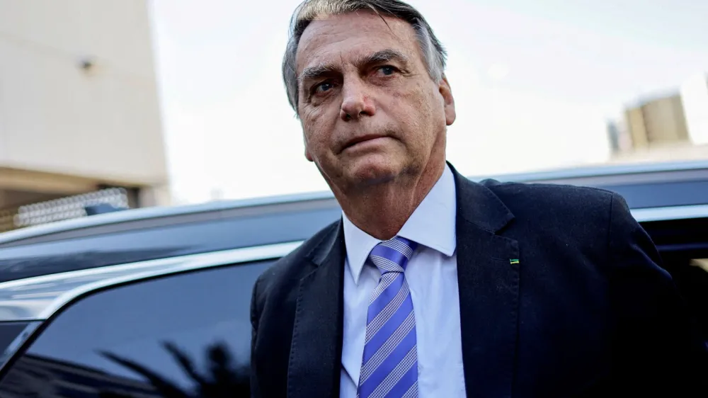 FILE PHOTO: Former Brazilian President Jair&nbsp;Bolsonaro&nbsp;leaves the&nbsp;Federal&nbsp;Police&nbsp;headquarters after testifying about the January 8 riots, in Brasilia, Brazil, October 18, 2023. REUTERS/Ueslei Marcelino/File Photo