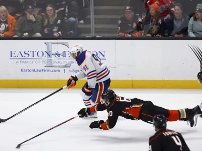 Feb 9, 2024; Anaheim, California, USA; Edmonton Oilers left wing Evander Kane (91) skates with the puck on a breakaway during the third period of a game against the Anaheim Ducks at Honda Center. Mandatory Credit: Jessica Alcheh-USA TODAY Sports