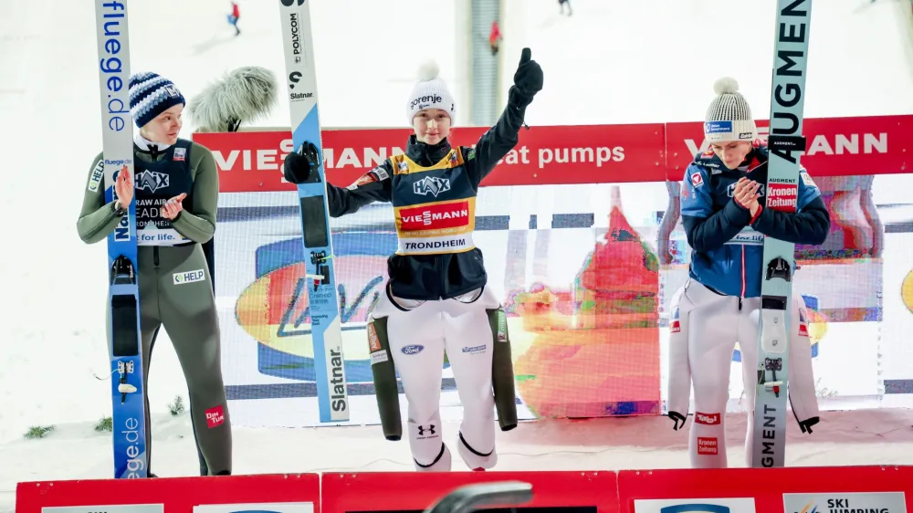 Winner Nika Prevc from Slovenia, centre, Eirin Maria Kvandal of Norway, who finished second at left and third placed Eva Pinkelnig from Austria, pose on the podium after the women's ski jumping, during the World Cup ski jumping at Gran&aring;sen in Trondheim, Norway, Wednesday, March 13, 2024. (Geir Olsen/NTB Scanpix via AP)