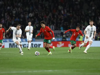 Timi Elšnik in Adam Gnezda Čerin26.3.2024 nogomet Slovenija - Portugalska prijatelska tekma - prijateljska nogometna tekma med reprezentancama Slovenije in PortugalskeFOTO: Luka Cjuha