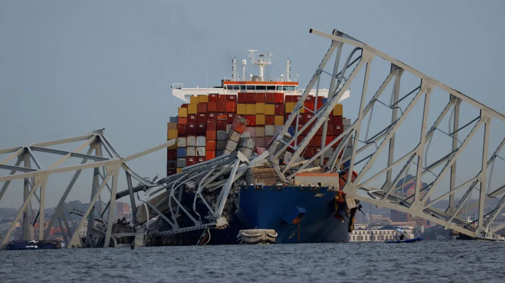 A view of the Dali cargo vessel which crashed into the Francis Scott Key Bridge causing it to collapse in Baltimore, Maryland, U.S., March 26, 2024. REUTERS/Julia Nikhinson