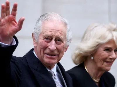 FILE PHOTO: Britain's King Charles leaves the London Clinic with Queen Camilla after receiving treatment for an enlarged prostate in London, Britain January 29, 2024. REUTERS/Hollie Adams/File Photo