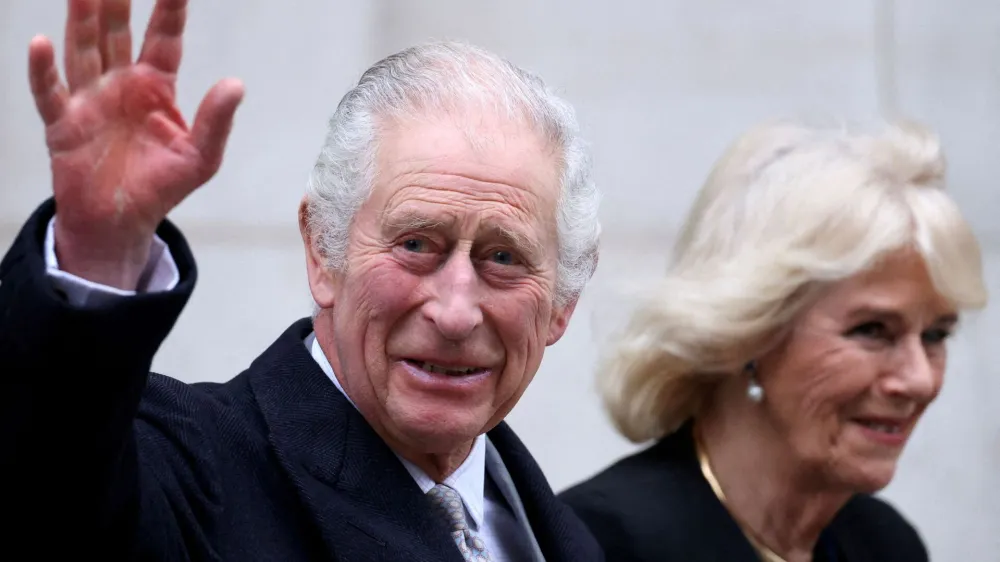 FILE PHOTO: Britain's King Charles leaves the London Clinic with Queen Camilla after receiving treatment for an enlarged prostate in London, Britain January 29, 2024. REUTERS/Hollie Adams/File Photo