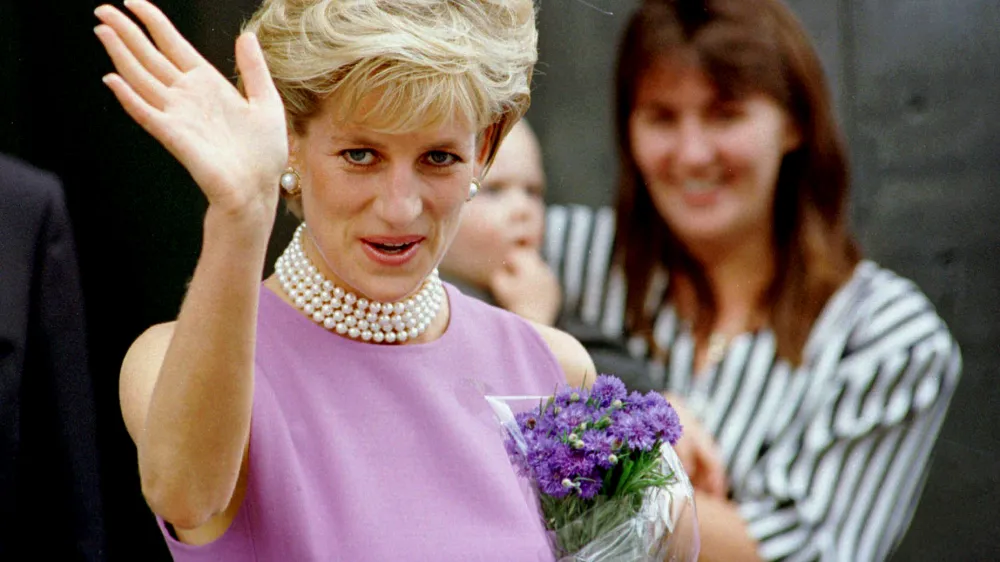 ** FILE **  Diana, Princess of Wales waves to the crowd as she leaves the Victor Chang Cardiac Research Institute in Sydney Australia, in this Friday, November 1, 1996 file photo. Friday Aug. 31, 2007 marks the 10th anniversary of Princess Diana's death in a Paris car crash. (AP Photo/Rick Rycroft)