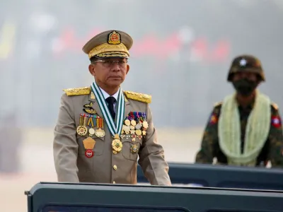 FILE PHOTO: Myanmar's junta chief Senior General Min Aung Hlaing, who ousted the elected government in a coup on February 1, 2021, presides over an army parade on Armed Forces Day in Naypyitaw, Myanmar, March 27, 2021. REUTERS/Stringer/File Photo