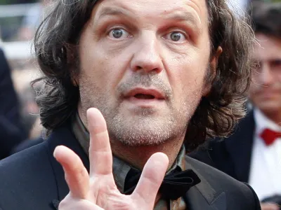 Serbian director Emir Kusturica arrives for gala screening of his film "Promise Me This" at the 60th Cannes Film Festival May 26, 2007.   REUTERS/Victor Tonelli (FRANCE)