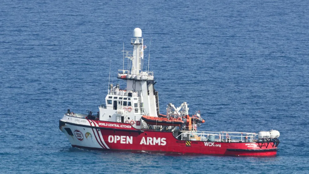 The Open Arms, a rescue vessel owned by a Spanish NGO, departs with humanitarian aid for Gaza from Larnaca, Cyprus, March 30, 2024. REUTERS/Yiannis Kourtoglou