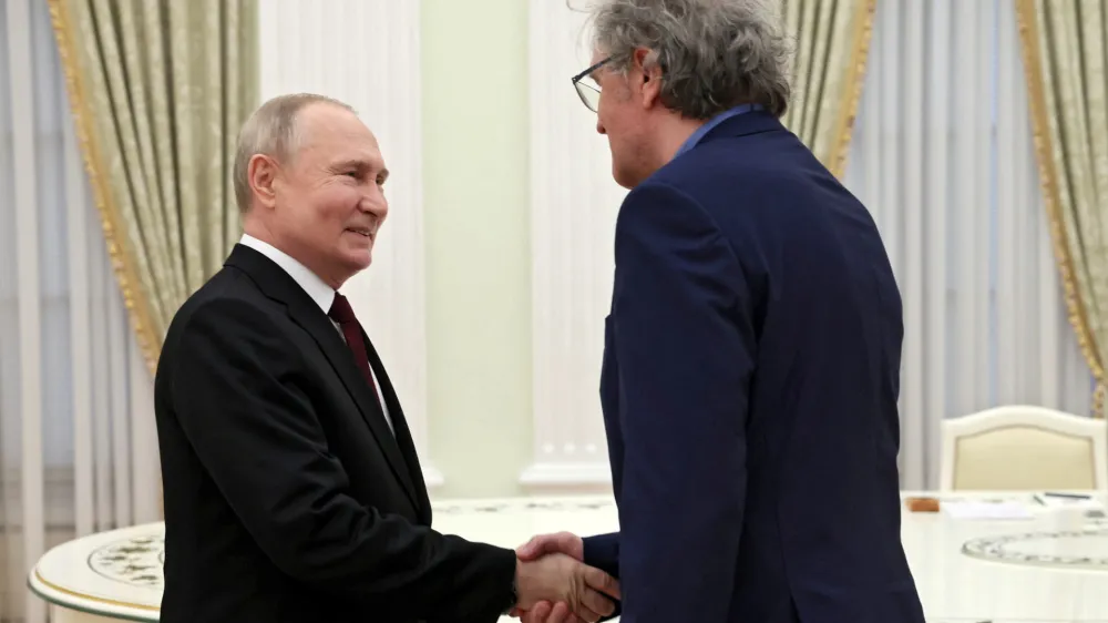 Russian President Vladimir Putin attends a meeting with Serbian film director Emir Kusturica in Moscow, Russia, April 2, 2024. Sputnik/Mikhail Metzel/Kremlin via REUTERS ATTENTION EDITORS - THIS IMAGE WAS PROVIDED BY A THIRD PARTY.