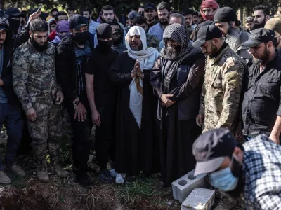 05 April 2024, Syria, Idlib: Syrians and members of Hay'at Tahrir al-Sham participate in the funeral of leader Maysar Al-Jubouri, who was killed as a result of an ISIS suicide bombing in his home in the city of Sarmada. Maysar Al-Jubouri, known as al-Qahtani, Iraqi national, one of the most prominent leaders of Hay'at Tahrir al-Sham. Photo: Anas Alkharboutli/dpa