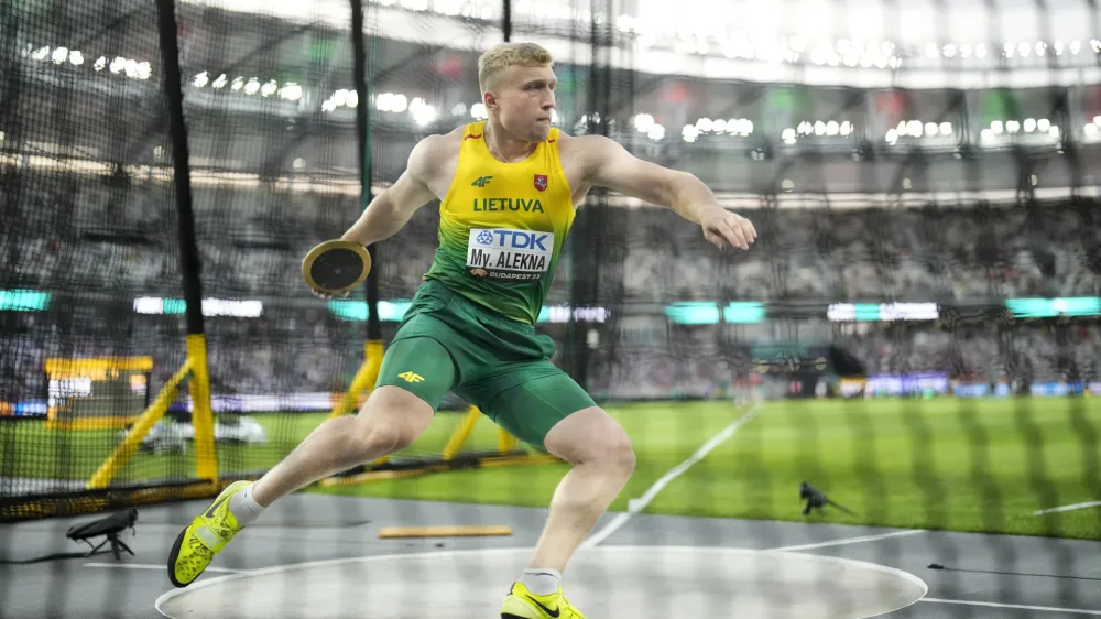Mykolas Alekna, of Lithuania, makes an attempt in in the Men's discus throw qualification during the World Athletics Championships in Budapest, Hungary, Saturday, Aug. 19, 2023. (AP Photo/Bernat Armangue)