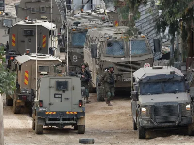 Israeli soldiers operate during a raid, at Nour Shams camp, in Tulkarm, in the Israeli-occupied West Bank, April 20, 2024. REUTERS/Raneen Sawafta