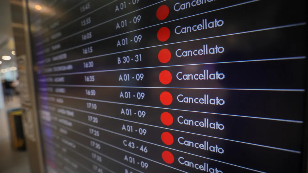 15 July 2023, Italy, Bologna: A monitor with the canceled flights at Marconi airport during a nationwide strike of airports ground staff, and check-in services. Photo: Guido Calamosca/LaPresse via ZUMA Press/dpa