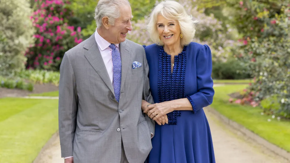 Britain's King Charles III and Queen Camilla stand in Buckingham Palace Gardens on Wednesday April 10, 2024, the day after their 19th wedding anniversary. This photo is being released on Friday, April 26, 2024, to mark the first anniversary of their Coronation. Buckingham Palace says King Charles III will resume his public duties next week following treatment for cancer. The announcement on Friday April 26, 2024, comes almost three months after Charles took a break from public appearances to focus on his treatment for an undisclosed type of cancer. (Millie Pilkington/Buckingham Palace via AP)
