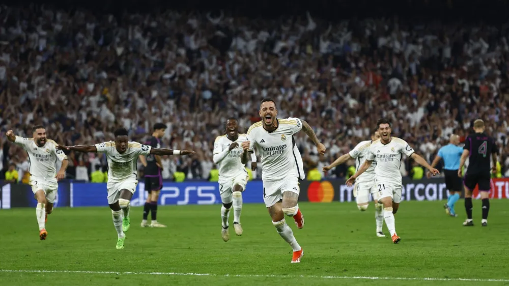 Soccer Football - Champions League - Semi Final - Second Leg - Real Madrid v Bayern Munich - Santiago Bernabeu, Madrid, Spain - May 8, 2024 Real Madrid's Joselu celebrates scoring their second goal REUTERS/Susana Vera