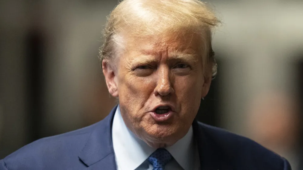 Republican presidential candidate, former President Donald Trump speaks to the media outside his trial at Manhattan criminal court Thursday, May 9, 2024, in New York. (Steven Hirsch/New York Post via AP, Pool)