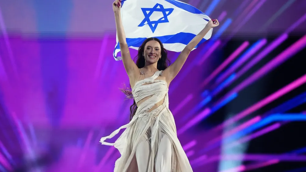 Eden Golan of Israel enters the arena during the flag parade before the Grand Final of the Eurovision Song Contest in Malmo, Sweden, Saturday, May 11, 2024. (AP Photo/Martin Meissner)