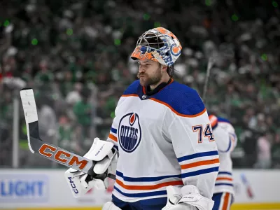 May 23, 2024; Dallas, Texas, USA; Edmonton Oilers goaltender Stuart Skinner (74) skates back on the ice during the overtime period against the Dallas Stars n game one of the Western Conference Final of the 2024 Stanley Cup Playoffs at American Airlines Center. Mandatory Credit: Jerome Miron-USA TODAY Sports