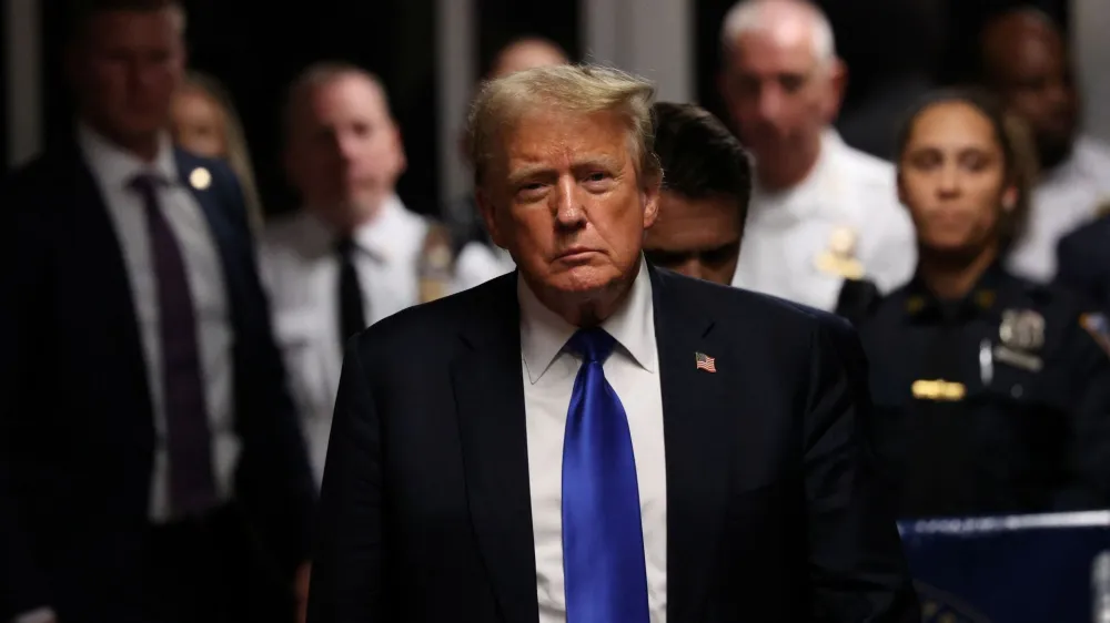 Former U.S. President Donald Trump walks out of the courtroom at the conclusion of his hush money trial at Manhattan Criminal Court on May 30, 2024 in New York City. A jury has found former U.S. President Donald Trump guilty on 34 felony counts of falsifying business records in the first of his criminal cases to go to trial. Sentencing is set for July 11th.   Michael M. Santiago/Pool via REUTERS