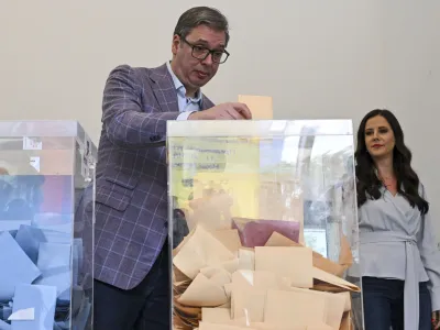 In this photo provided by the Serbian Presidential Press Service, Serbian President Aleksandar Vucic casts his ballot for a local election at a polling station in Belgrade, Serbia, Sunday, June 2, 2024. (Serbian Presidential Press Service via AP)
