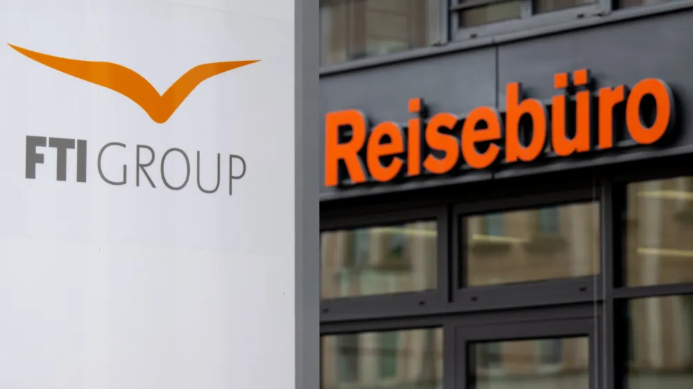 FILED - 31 January 2023, Bavaria, Munich: The logo of the tour operator FTI (FTI Group) is on the company headquarters in front of a travel agency. German travel group FTI Touristik GmbH, the parent company of the FTI Group, Europe's third-largest tour operator, has filed for insolvency. Photo: dpa