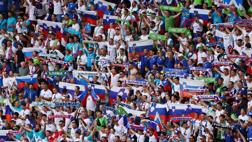 Soccer Football - Euro 2024 - Group C - Slovenia v Denmark - Stuttgart Arena, Stuttgart, Germany - June 16, 2024 Slovenia fans before the match REUTERS/Leonhard Simon