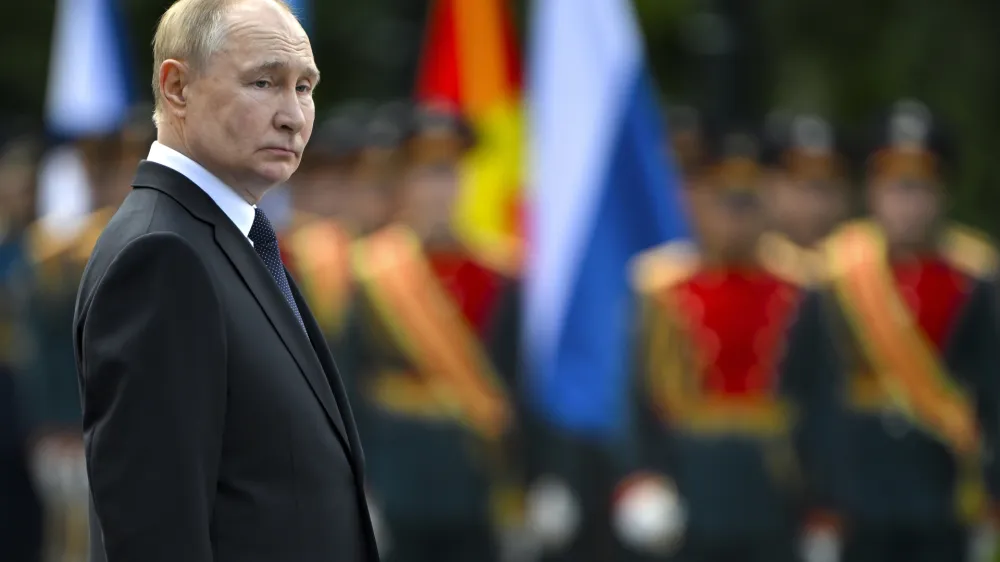 Russian President Vladimir Putin attends a wreath laying ceremony at the Tomb of Unknown Soldier near the Kremlin Wall in Moscow, Russia, on Saturday, June 22, 2024, marking the 83rd anniversary of the Nazi invasion of the Soviet Union and on the Day of Memory and Sorrow. (Sergei Guneyev, Sputnik, Kremlin Pool Photo via AP)