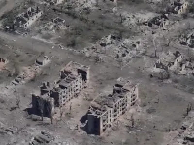 Drone view shows destroyed buildings in the frontline town of Chasiv Yar in Donetsk region, Ukraine, in this screengrab obtained from social media video released on July 4, 2024. Special Purpose Battalion "Donbas" of the 18th Slavic Brigade of the NGU/via REUTERS THIS IMAGE HAS BEEN SUPPLIED BY A THIRD PARTY. MANDATORY CREDIT. NO RESALES. NO ARCHIVES. WATERMARK FROM SOURCE. BEST QUALITY AVAILABLE.