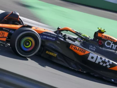 McLaren driver Lando Norris of Britain steers his car during the Formula One Dutch Grand Prix race at the Zandvoort racetrack, Netherlands, Sunday, Aug. 25, 2024. (AP Photo/Peter Dejong)
