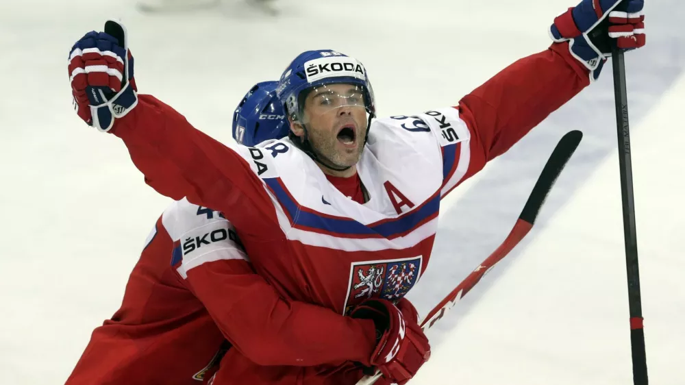 Jaromir Jagr (R) of the Czech Republic celebrates with his teammate Michal Jordan after scoring a goal against Finland during their Ice Hockey World Championship quarterfinal game at the O2 arena in Prague, Czech Republic May 14, 2015. REUTERS/David W Cerny