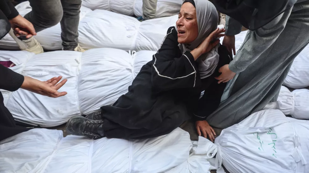 Relatives of Palestinians who are killed following the Israeli attack on the Nuseirat refugee camp mourn after the bodies are transferred to Al-Aqsa Martyrs Hospital for burial in Deir al-Balah, Gaza, on September 1, 2024, amid the ongoing conflict between Israel and the Palestinian Hamas movement. (Photo by Majdi Fathi/NurPhoto)NO USE FRANCE