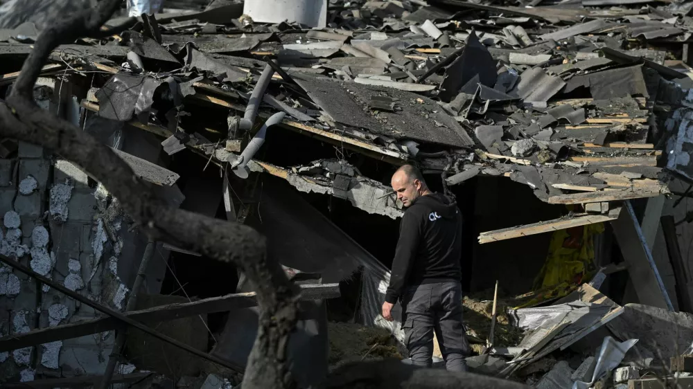 A man stands next to his house destroyed by a Russian air strike, amid Russia's attack on Ukraine, in Zaporizhzhia, Ukraine October 10, 2024. REUTERS/Stringer