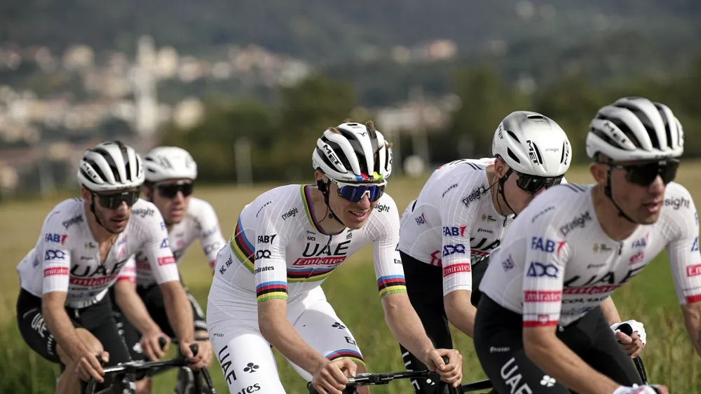 Reigning World Champion Slovenia's Tadej Pogacar, center, pedals during Il Lombardia, Tour of Lombardy cycling race, Italy, Saturday, Oct. 12, 2024. (Marco Alpozzi/LaPresse via AP)