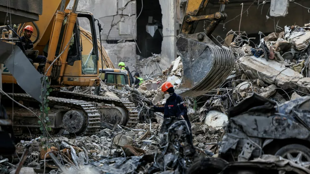 Civil defense members and rescuers work at the site of an Israeli strike in Beirut's Basta neighbourhood, amid the ongoing hostilities between Hezbollah and Israeli forces, Lebanon November 23, 2024. REUTERS/Thaier Al-Sudani