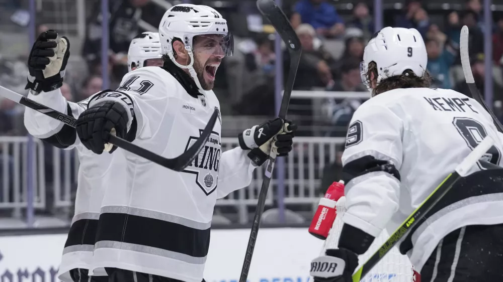 Los Angeles Kings center Anze Kopitar (11) reacts after scoring a goal during the second period of an NHL hockey game against the San Jose Sharks, Monday, Nov. 25, 2024, in San Jose, Calif. (AP Photo/Godofredo A. V&aacute;squez)