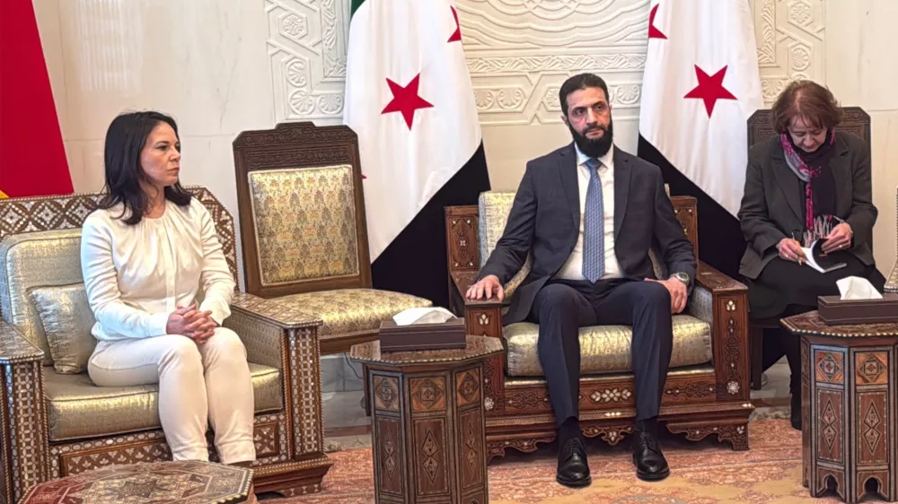 03 January 2025, Syria, Damascus: Germany's Foreign Minister Annalena Baerbock meets with Syria's new leader, Ahmed al-Sharaa, at the presidential palace in Damascus. Baerbock is on a surprise visit to Syria, roughly four weeks after the fall of long-term ruler Bashar al-Assad. Photo: J&ouml;rg Blank/dpa